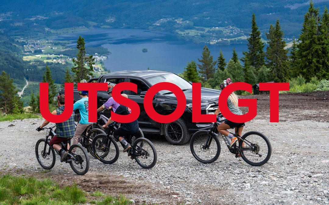 Maxus Pickup på fjellet med mange syklister