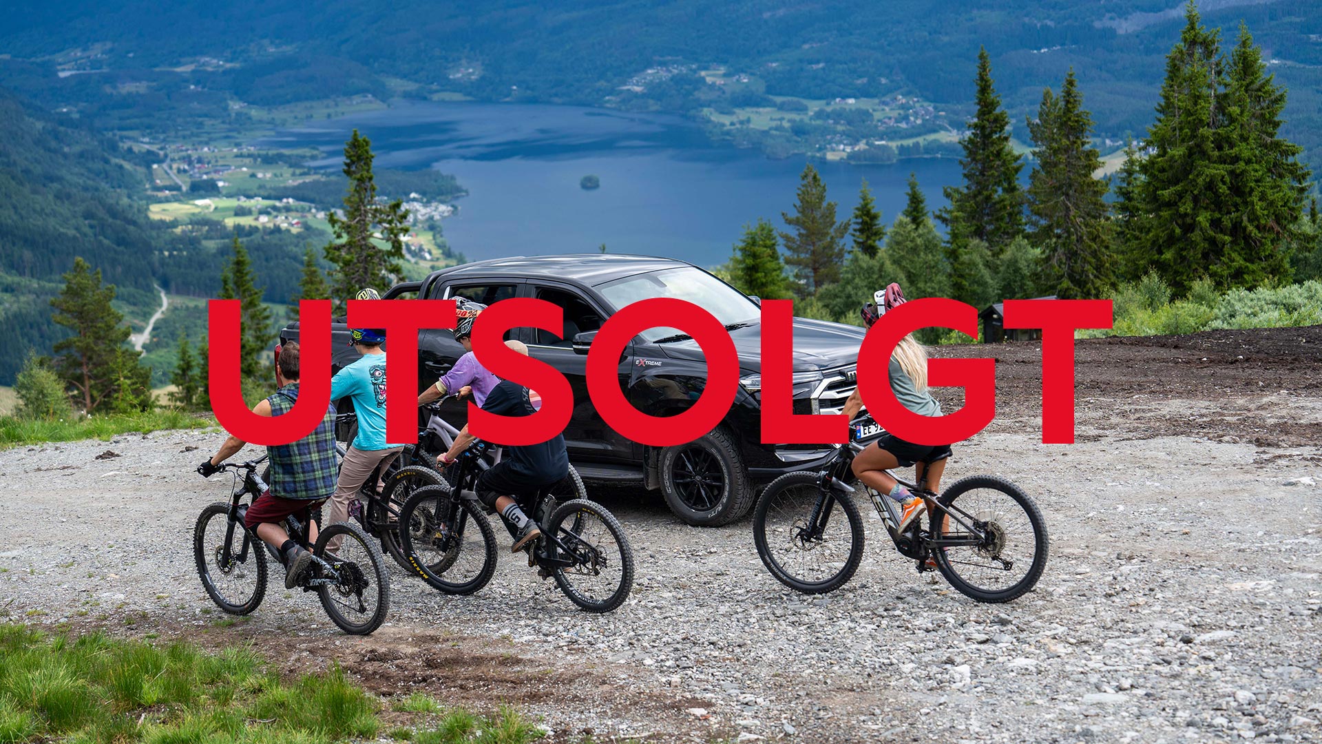 Maxus Pickup på fjellet med mange syklister